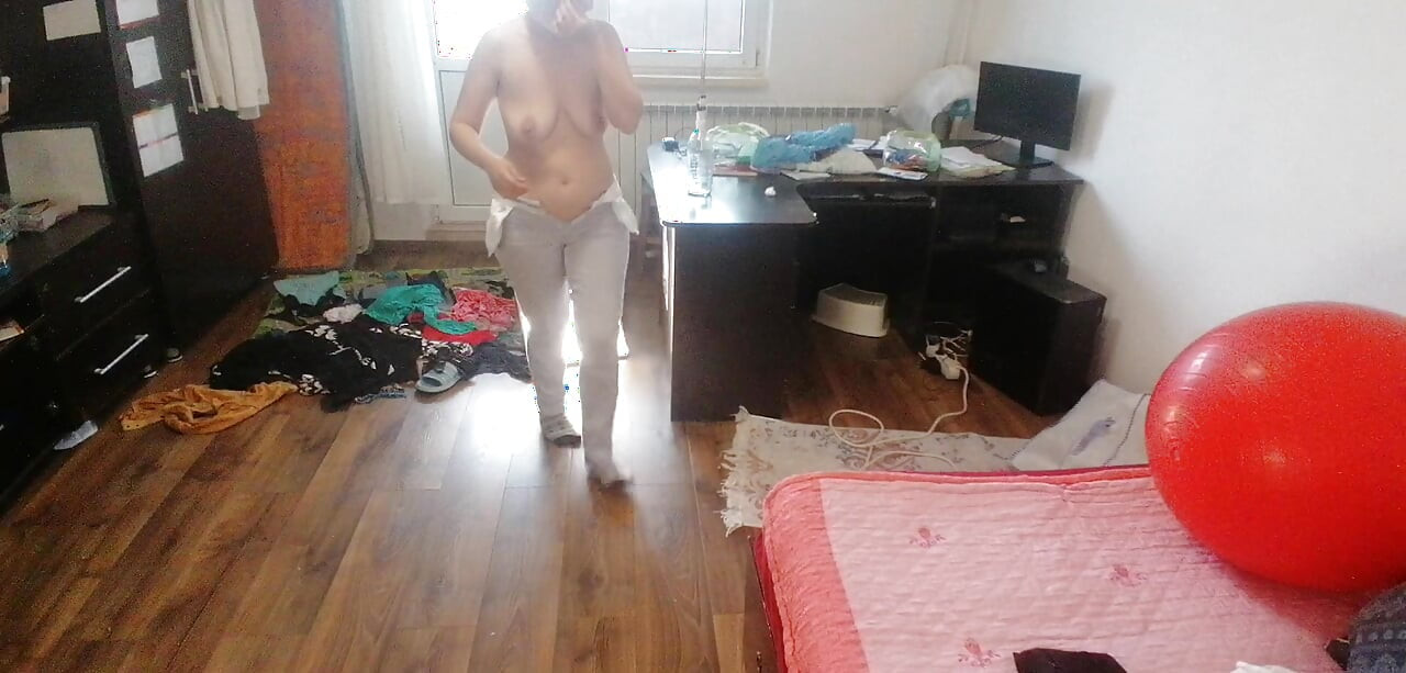 Sexy wife dances naked at home.