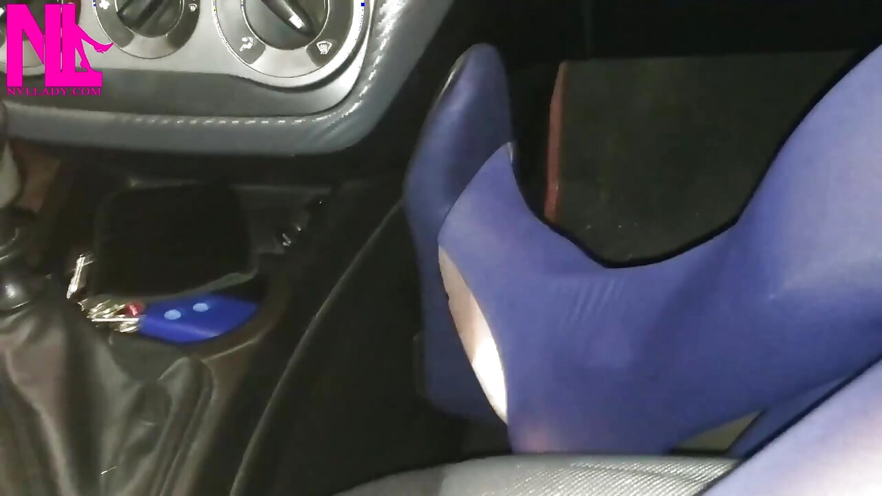Dangling in Blue Pantyhose and Blue Flats on a Gas Station
