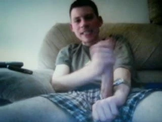 young guy on cam jerking his huge cock