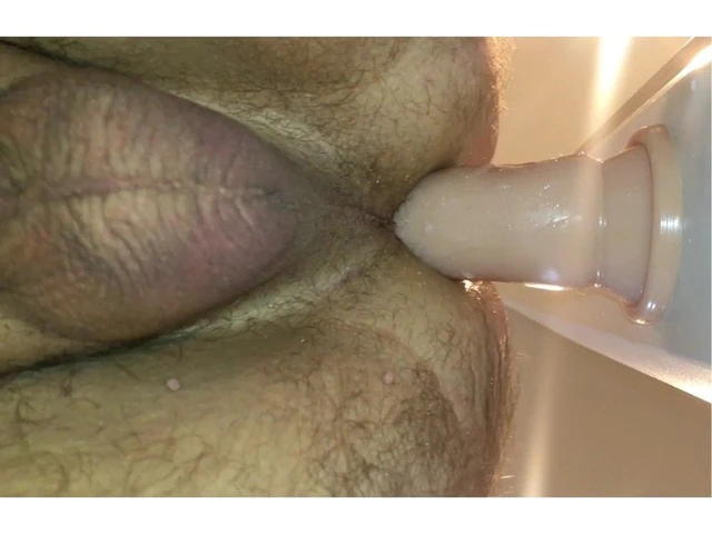 Progressively bigger dildos up my ass