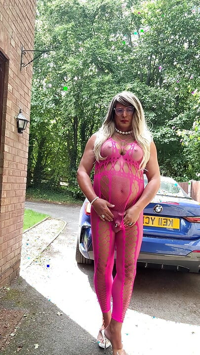 Sexy Crossdresser Kellycd2022's in pink fishnet catsuit and heels