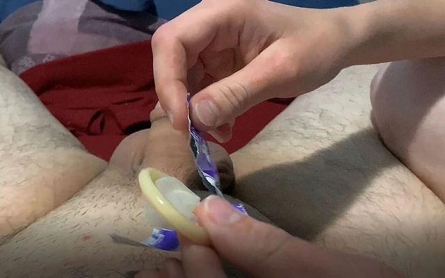 She jerks me off with a condom and I cum inside