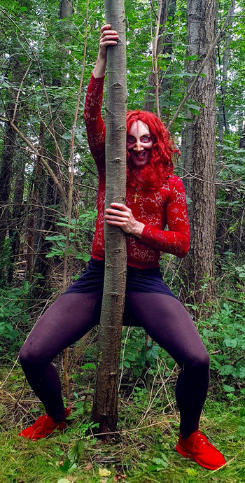 Demonic bitch masturbates in the woods