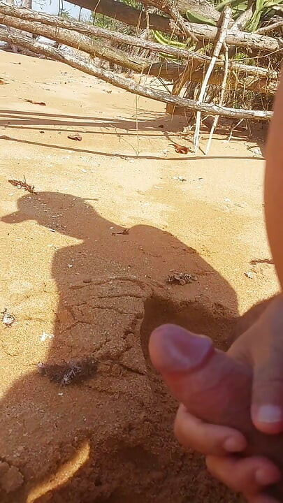 Ladysilva masturbating his cock on a deserted beach until he cums hot