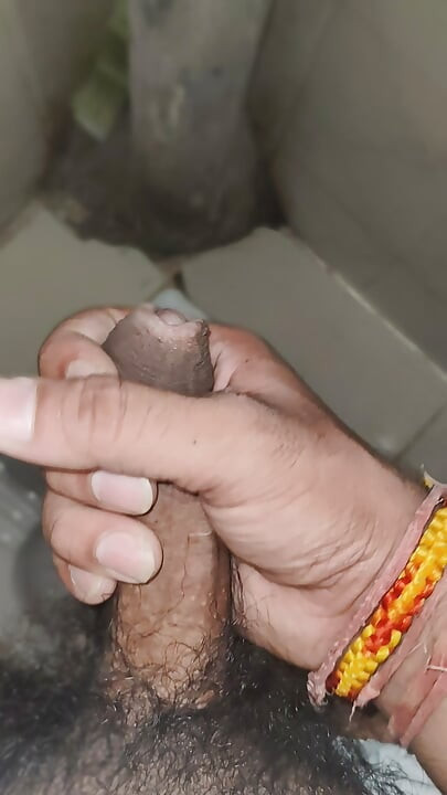 Indian boy masturbating in bathroom
