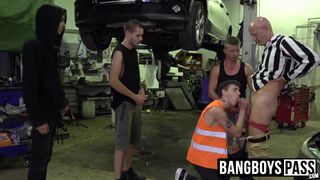 Mature man bent over and drilled by car shop workers