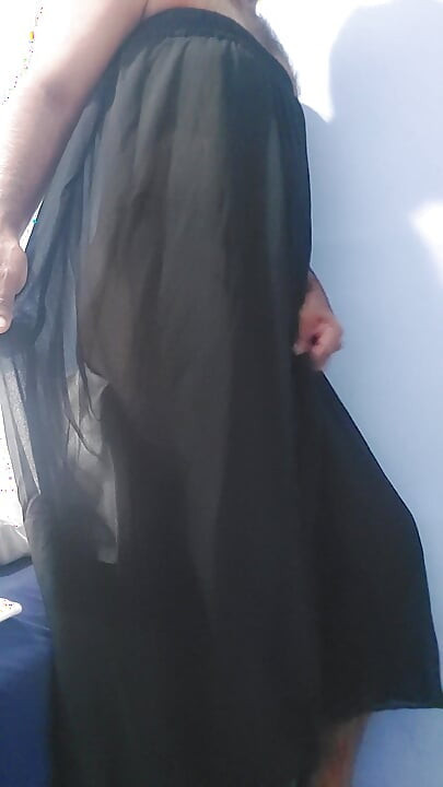 I'm masterbating and cum wearing a Silk Seethrough black skirt