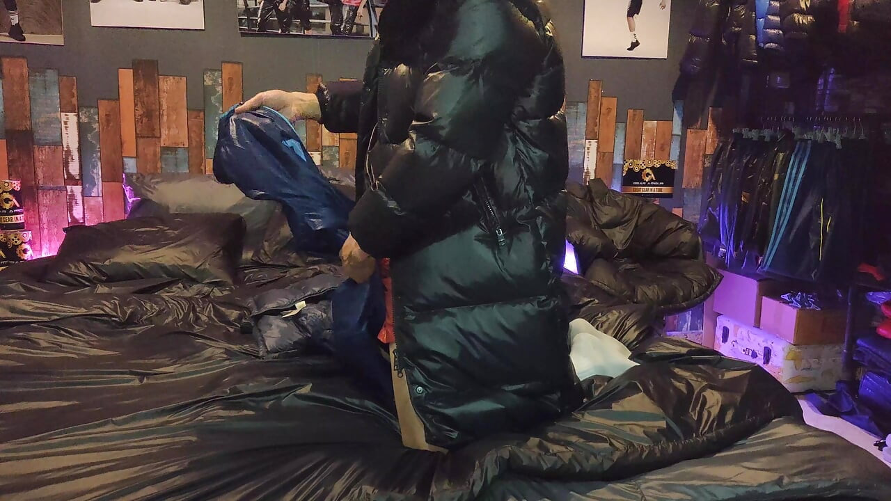 Cock Rubbing Down Jacket on Shiny Nylon Bed