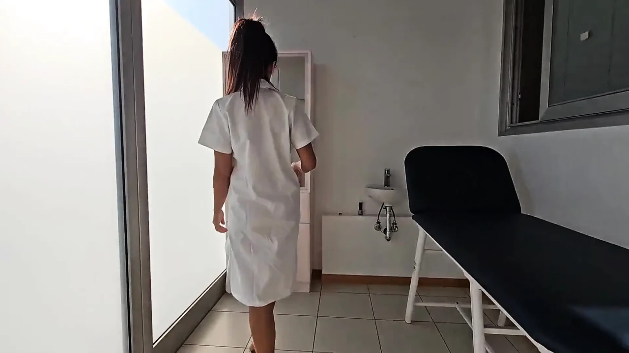 Sexy Doctor Masturbates on the Bed While Waiting for Her Patient
