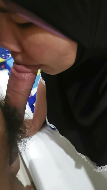 A Muslim girl has just been exercising tiredly before she finds a big stuffed in her mouth.