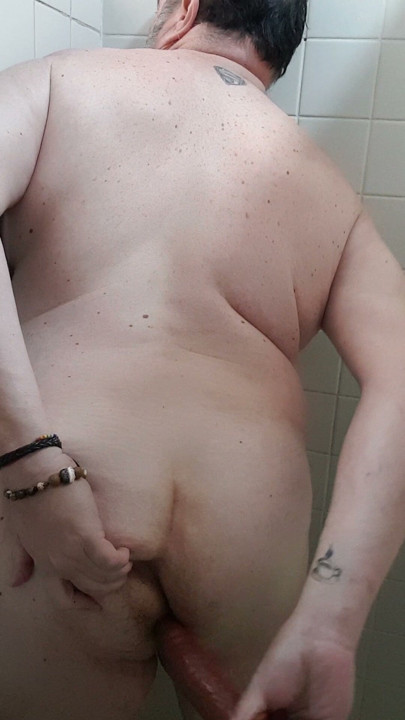 Playing with my dildo while I take a bath