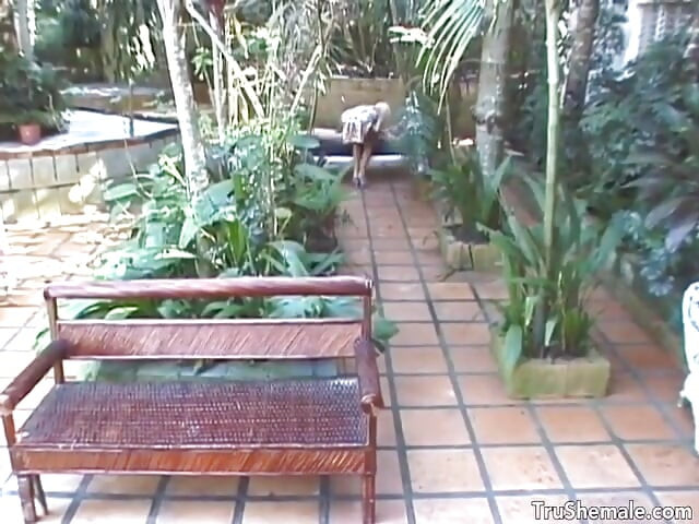 Blonde trans housewife Fernanda Zocal ties up the pool boy and uses him for pleasure