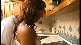 Horny stud loves to give his hard cock to this busty MILF in the kitchen