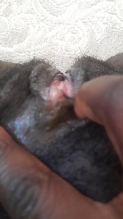 German black fat hairy wet  Pussy with big clit closeups