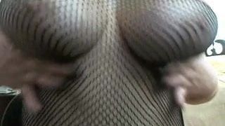 Fishnet bodystocking tease