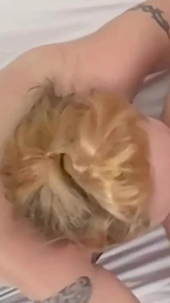 Iconic moment from "Blonde sub Milf sucks cock and licks ass deeply"