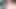 Tombul ateşli orta yaşlı seksi kadın kasabada ve inşaatta üstsüz araba kullanıyor ve büyük doğal memeler ve meme uçlarıyla oynuyor