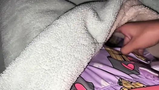 Hot young girl. Under the sheets, she wets her panties with orgasm.