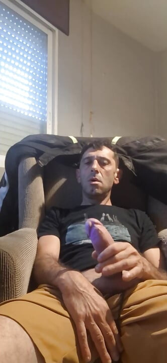 Guy masturbating on the sofa