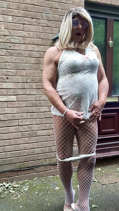Sexy Crossdresser kellycd2022 in white lace outfit fishnet pantyhose and heels
