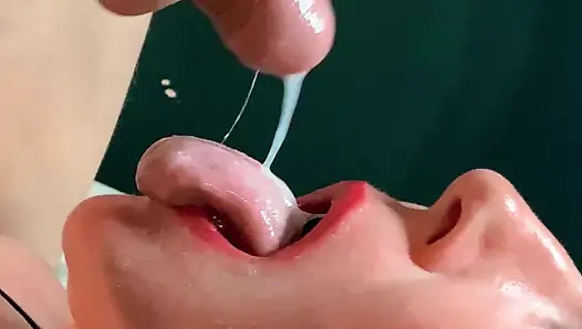 FORESKIN: She gags from huge amounts of sperm , going down her throat CLOSEUP