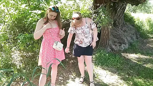 Two women girl and mature milf took off red panties peeing on side of road in public Pee Outdoor Outside  Lesbians kiss