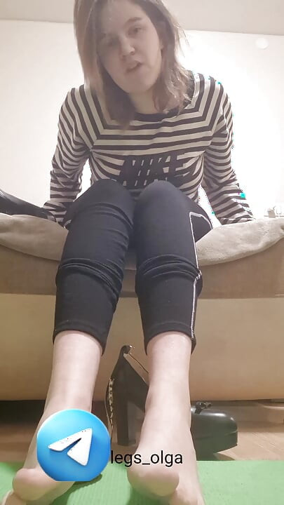 The girl makes you lick your feet and shoes. Sweet femdom