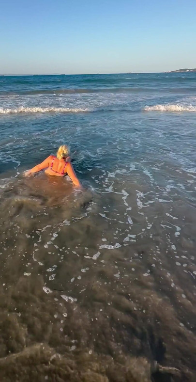 Try Not to Wet My Hair While Play with the Waves