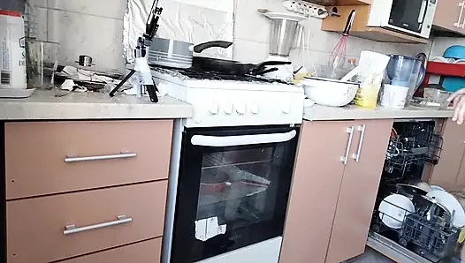 Sexy wife prepares lunch naked in the kitchen.