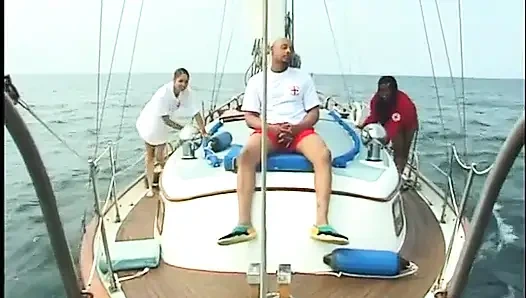 Couple of nice ebony babes are doing one cock on the deck of sailing ship