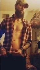 bearded redneck country boy pumps out a load