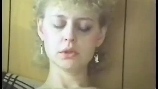 Cock-loving slut gives head while riding guy on the couch