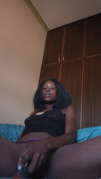 Unforgettable moment from "Biglips38 playing happily with beads in her waist and  black dildo and cuming quitely"