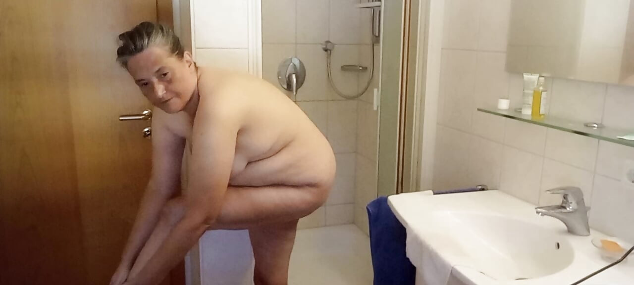 German BBW MILF 53 oils her soft fat body after showering