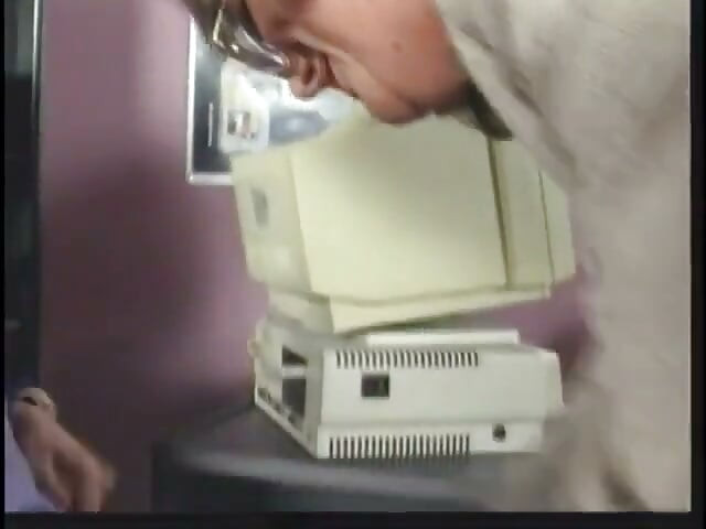Mature brunette sucks and takes cock by desk at work