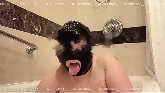 Naked Asian teen licking and playing lotion in tub