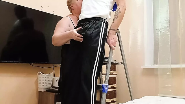 after repairing the chandelier, my mother-in-law jerks off my dick to a cumshot