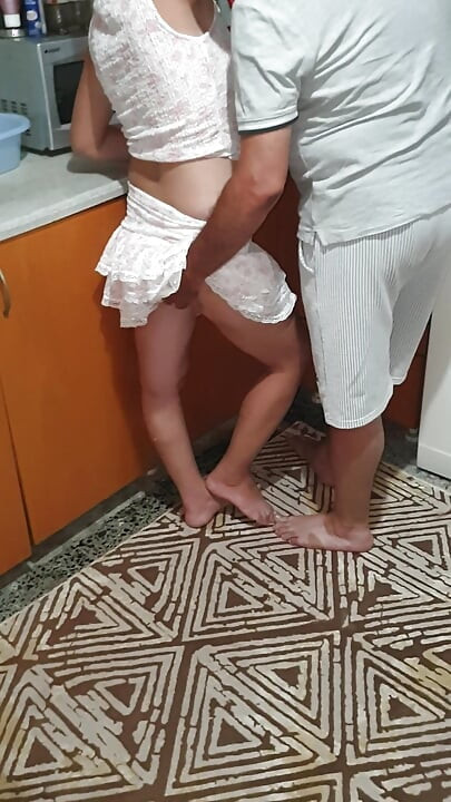 A Turkish couple flirting in the kitchen.