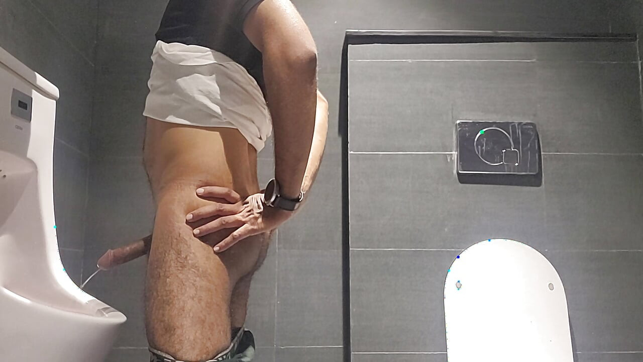 Horny Office Worker Sneaks into Washroom to Masturbate After a Long Day