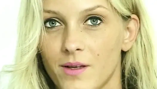 Sexy blonde babe is filling her snatch with a huge dildo