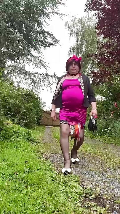Dressed in a little fuchsia dress for an evening