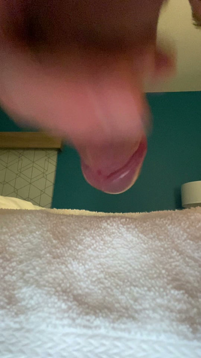 Rubbing the cock while she watches