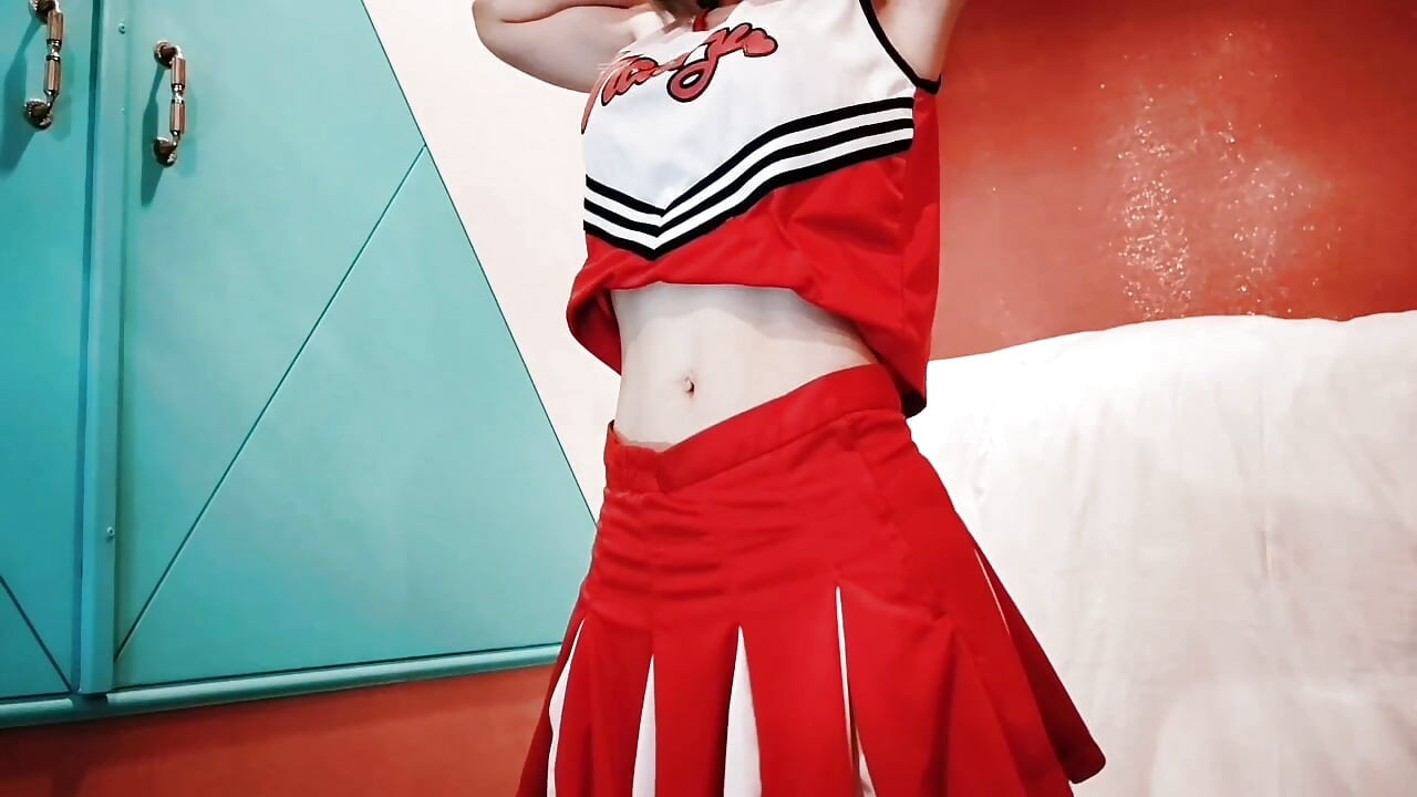 A cute busty married woman exercises 2 in a sexy cheerleader costume. Home made amateur Private Shoot
