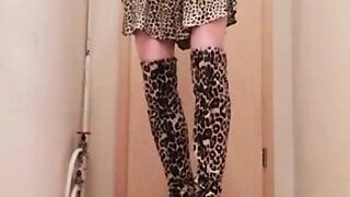 Stripping and playing in Tiger dress and boots