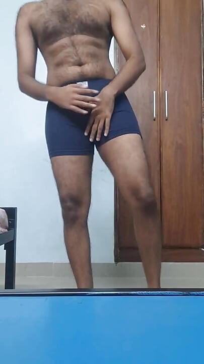 Hot hairy indian college guy strips, fingers ass hole, jerks his dick, moans and cums in his hostel room