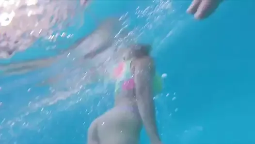 Mature lady underwater swimming