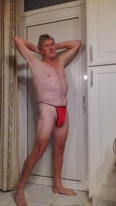 I reveal myself in a thong and perform a striptease.