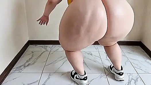 Frau mit dicken hintern in orange leggings bewegt sich