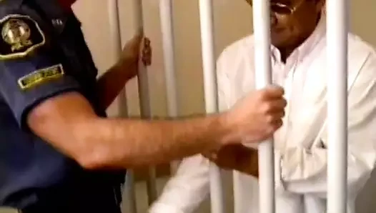 Horny prisoner sucks his guard's cock