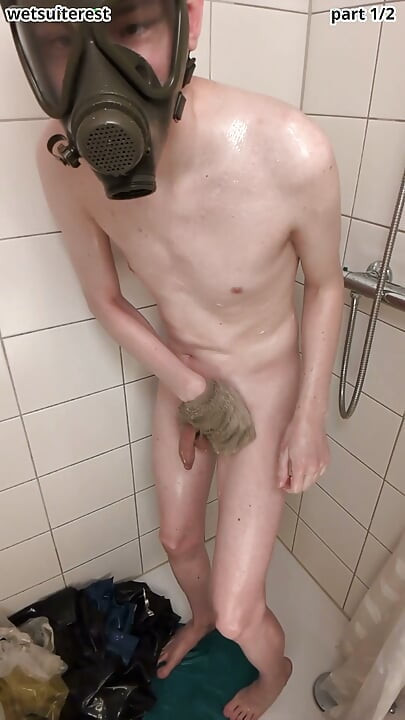 Twink showering with gas mask